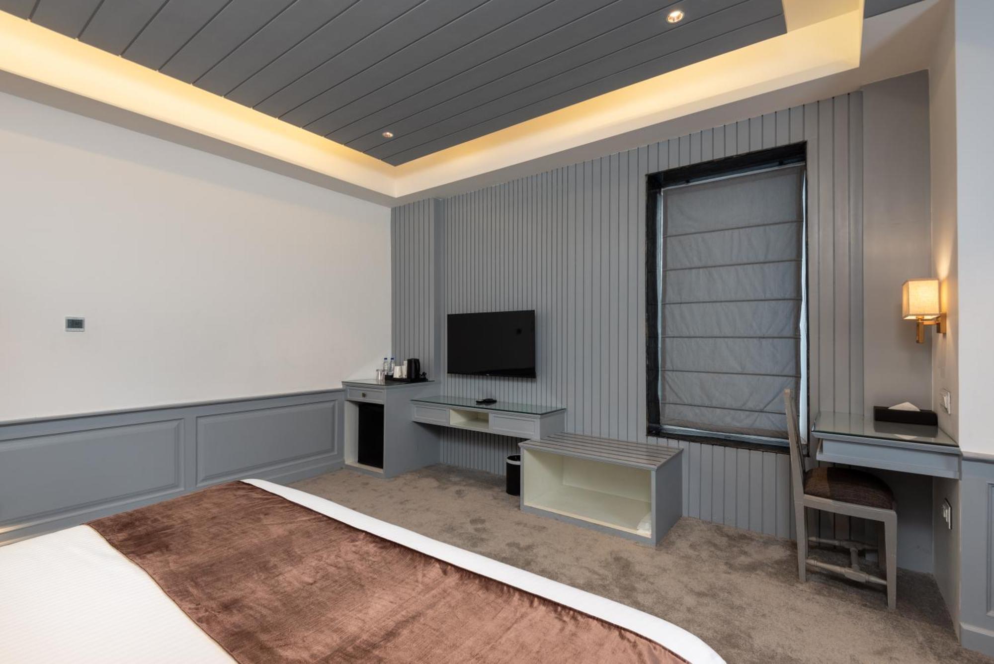 Hotel Grand Boulevard Durgjan Chambre photo
